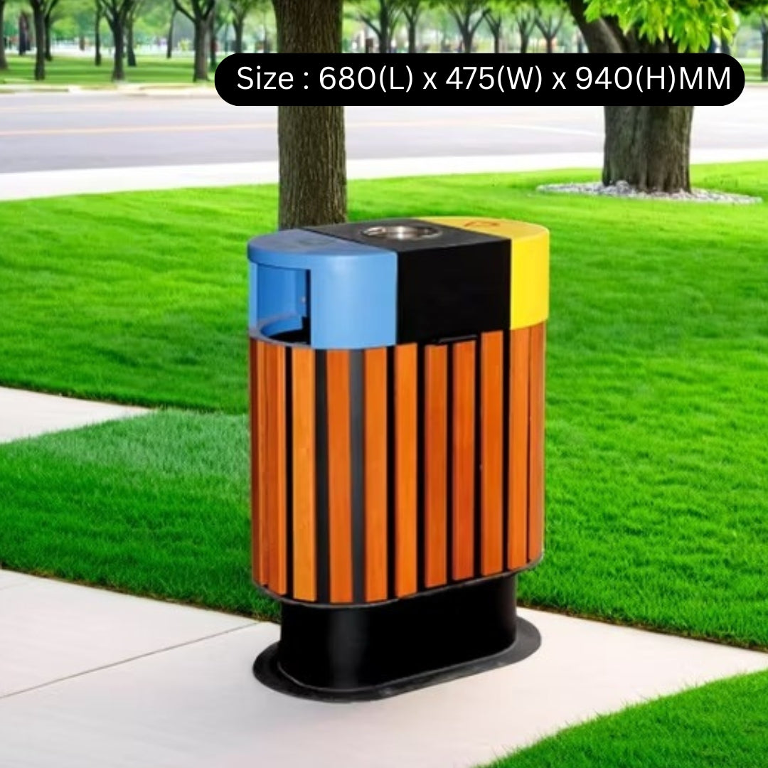 Multicolored outdoor trash bin with dimensions displayed on a grassy area.