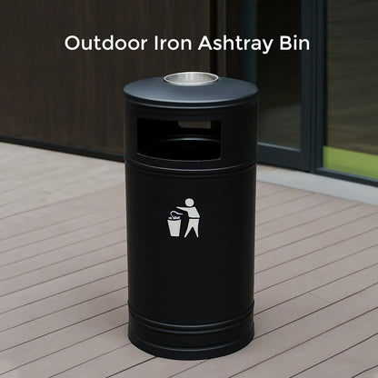 Black outdoor iron ashtray bin with a lid on a wooden deck.
